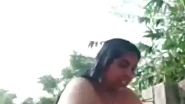 Nude desi Bhabhi bathing outdoors and enjoys video call sex