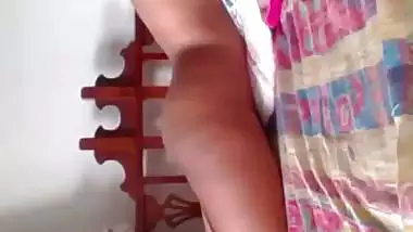 Indian girl playing guitar on pussy