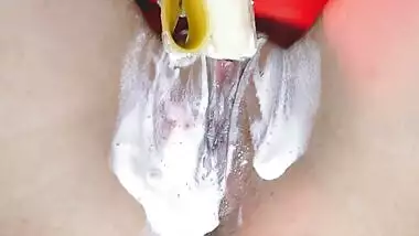 Vagina eats banana with cream