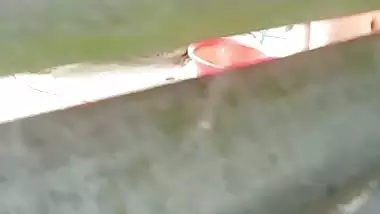 Neighbor Bengali aunty bathing outdoor caught on camera