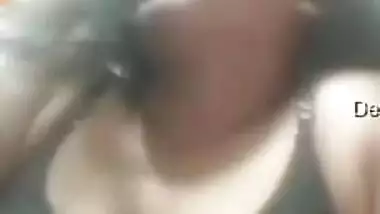 Desi wife flashes tits just for a moment and then hides them again