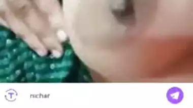 Stripchat girl Trisha playing with naked boobs