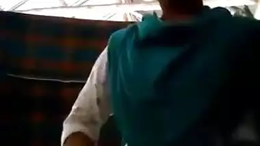 Tempting Desi mom flashes saggy tits and gets dressed in the barn