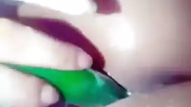 Wicked Indian sexually excited hotty fucking her twat with a zucchini
