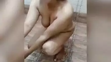 Busty girl friend shy in toilet