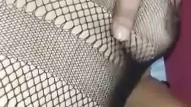 Hot Desi babe in fishnet dress has her pussy XXX rubbed by lover