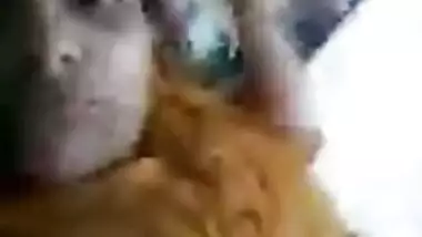 During video call Desi chick proves BF she lies naked in XXX bed