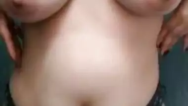 Big Titty Goth Stripteasing and Playing with Her Tits and Ass