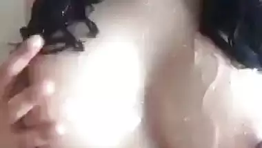 Sexy babe with hard boobs taking a nude bath