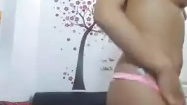 Desi chick with a wide smile strips in free XXX webcam porn show